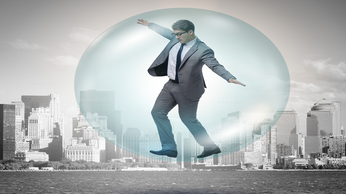 Man standing on urban bubble Man standing on urban bubble
